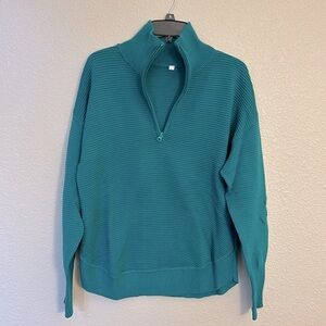 Women’s 3/4 zip green sweater size large.